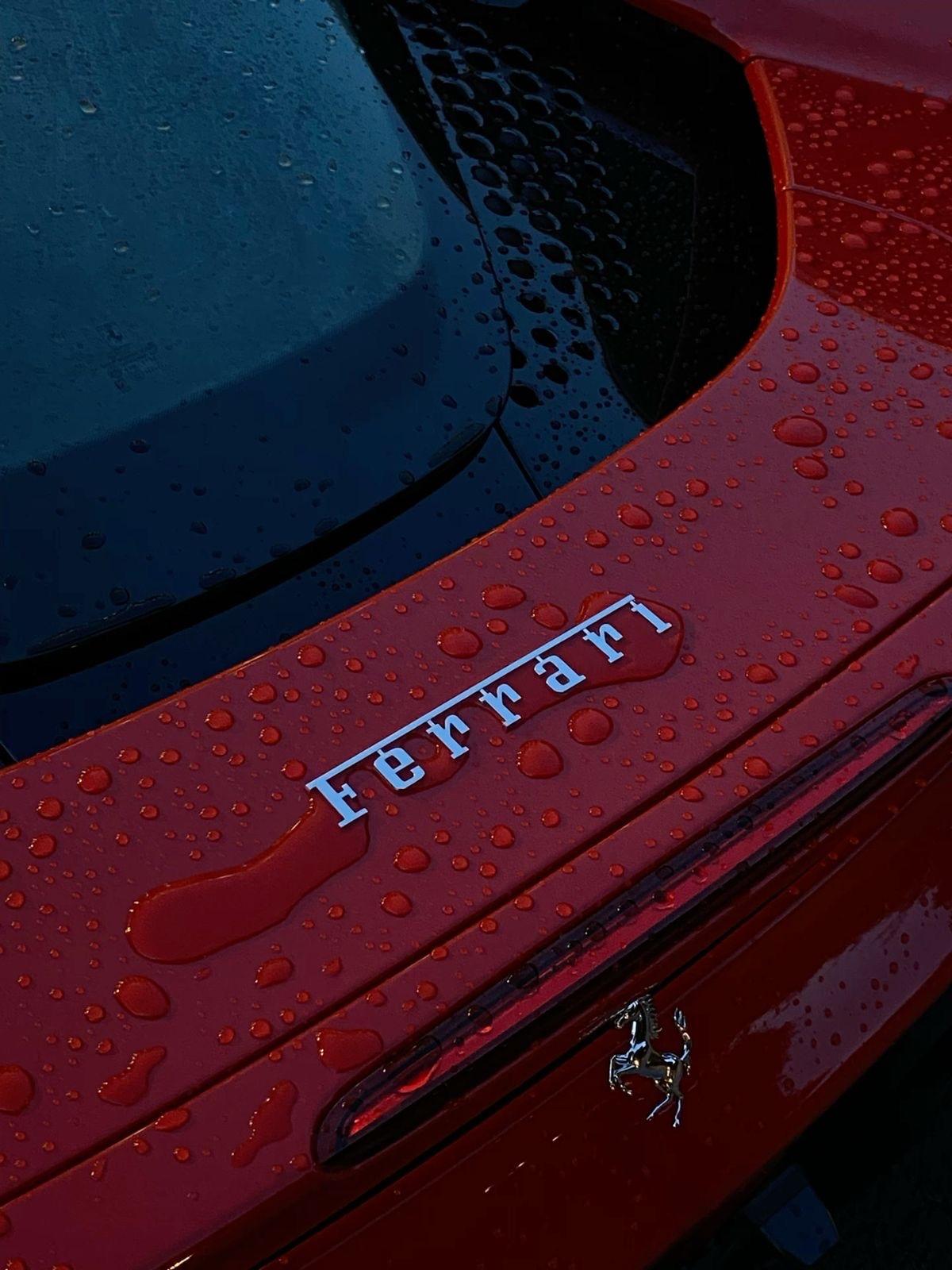 Stunning Red Ferrari with Rain Drops