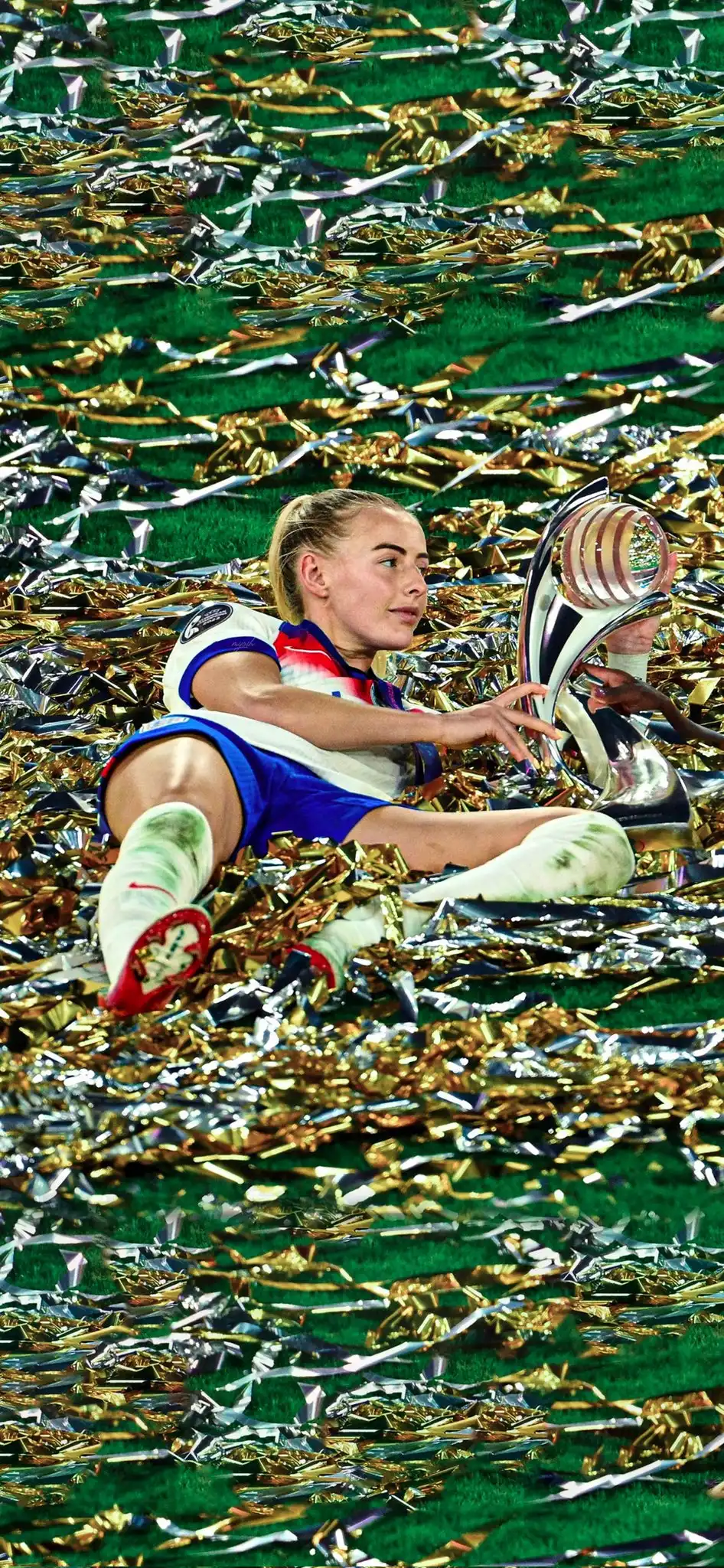 England Lionesses Player with Trophy on Confetti Pitch