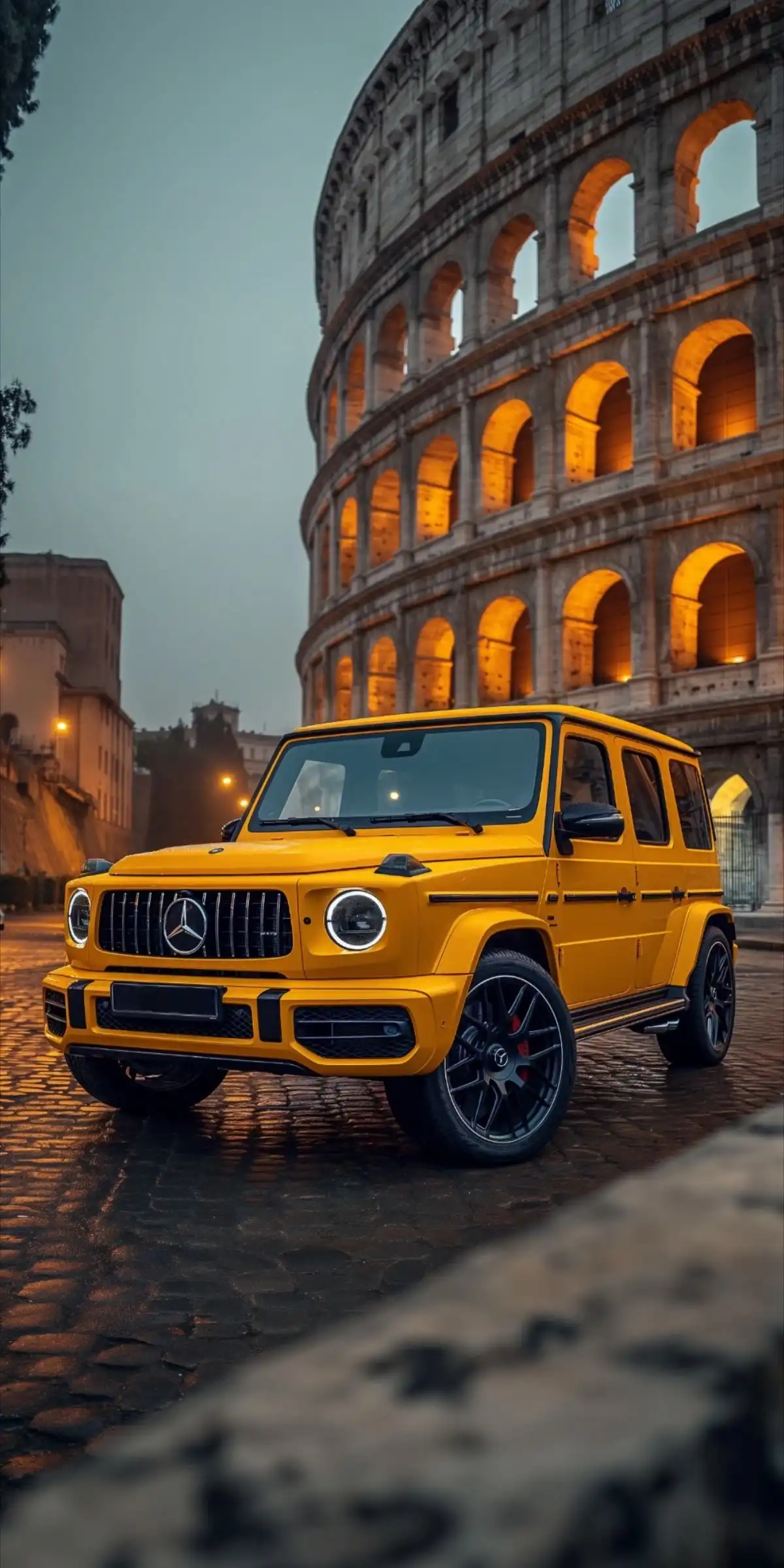 Yellow Mercedes-Benz G-Wagen G63 AMG in front of Roman Colosseum